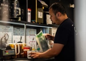 Kitchen worker making a bubble tea in CUPP